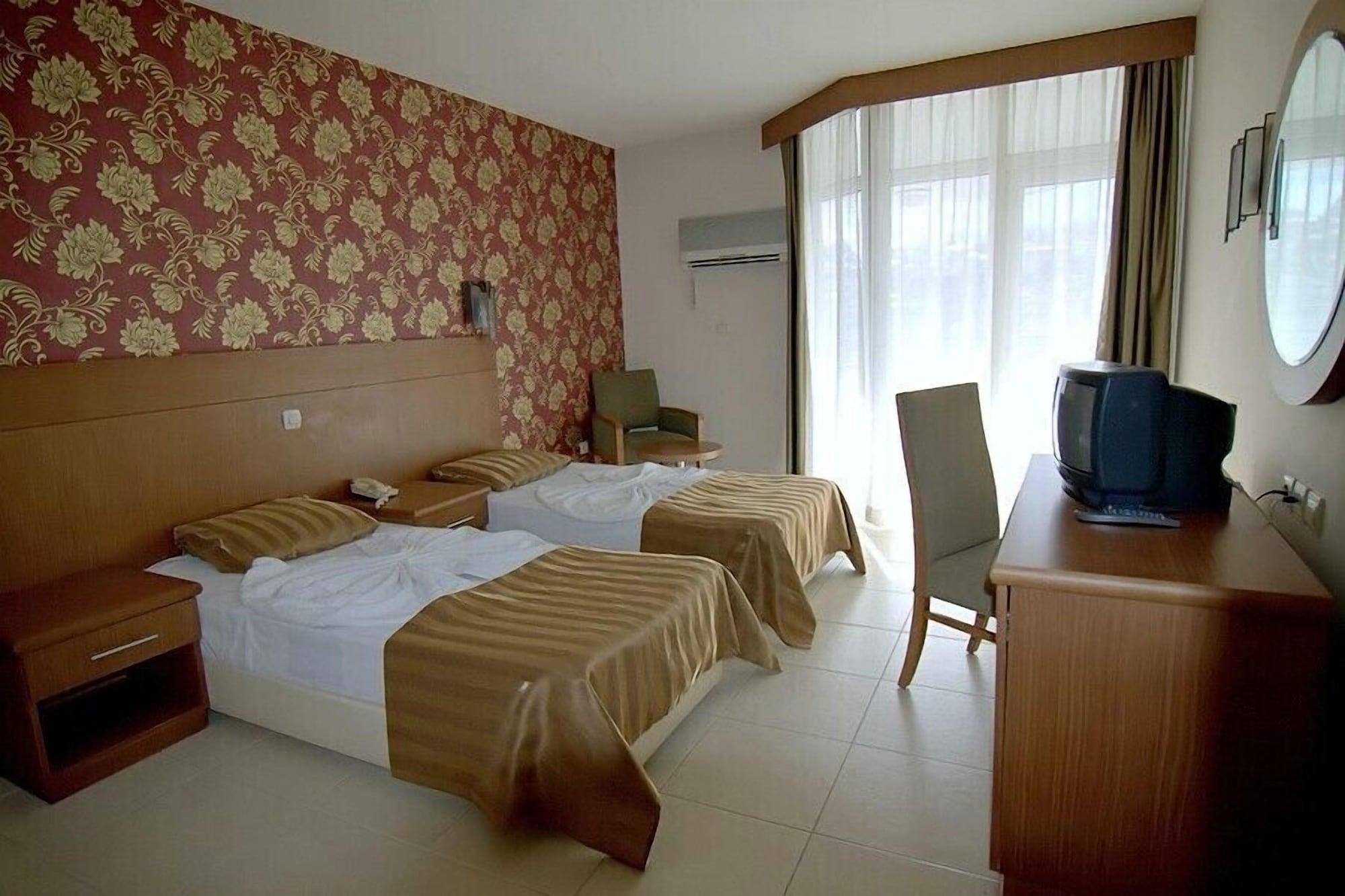 Surtel Hotel คูซาดาซี ภายนอก รูปภาพ