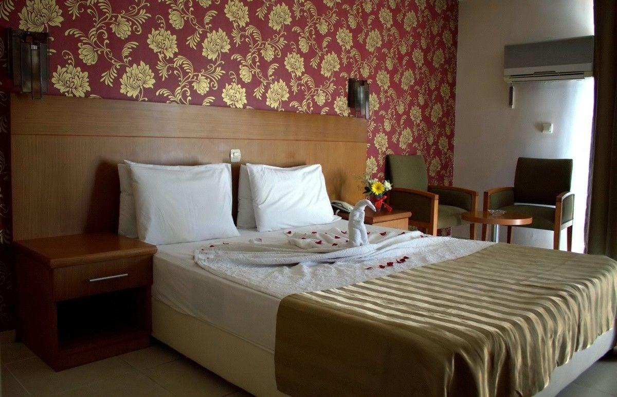 Surtel Hotel คูซาดาซี ภายนอก รูปภาพ