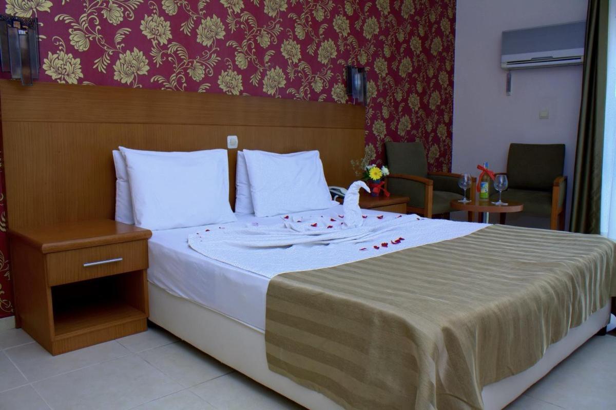 Surtel Hotel คูซาดาซี ภายนอก รูปภาพ